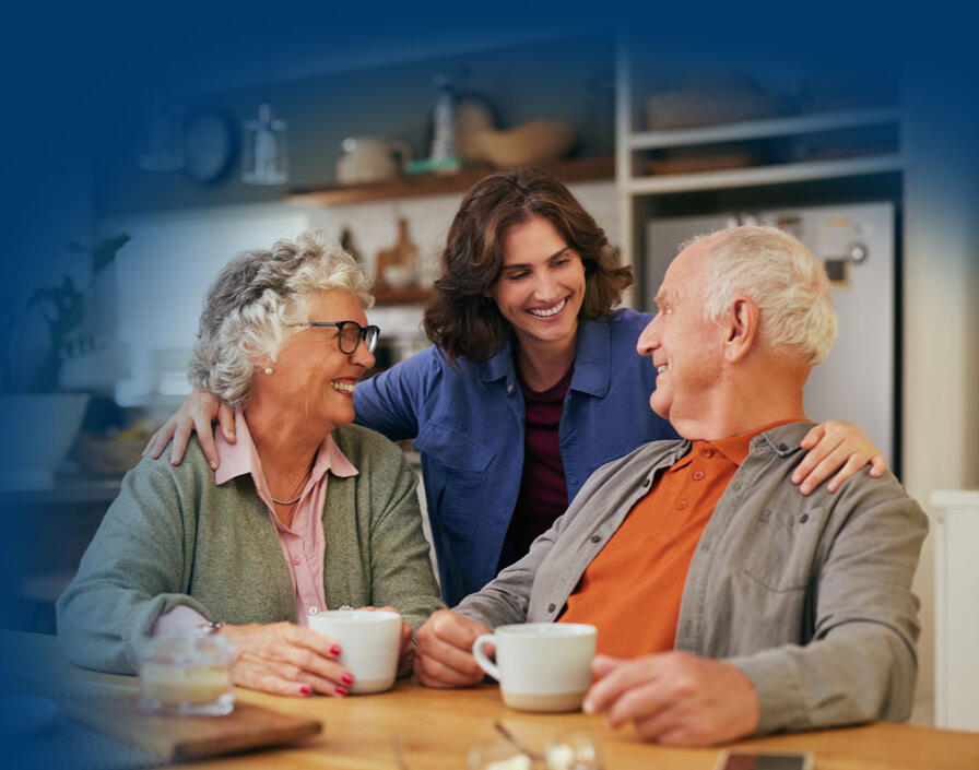 caregiver with senior couple